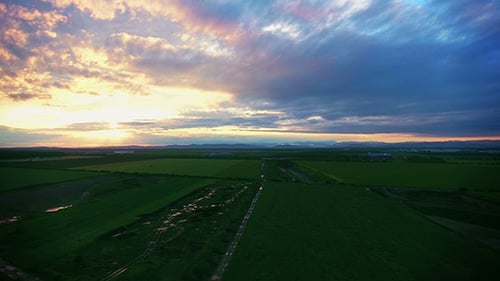 Sunset Over A Field Of Wheat