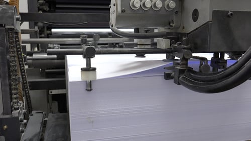 Automated Machine Handling Paper in a Workplace