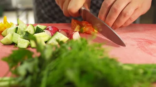 Chef Chopping Tomato For Fresh Salad Preparation