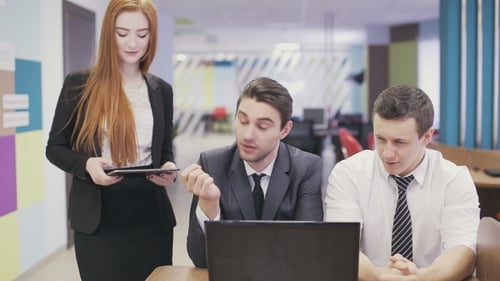 Serious Brainstorming Of Business People In Office