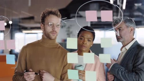 Diverse Group of Finance Office Worker Having Corporate Training and Using Glass Board