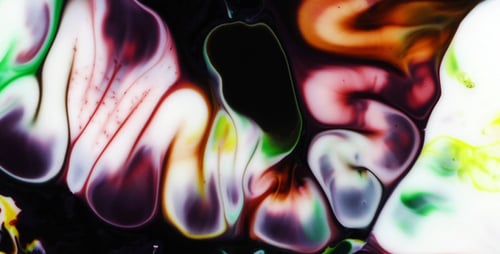 Abstract Colorful Paints Mixing and Flowing Together