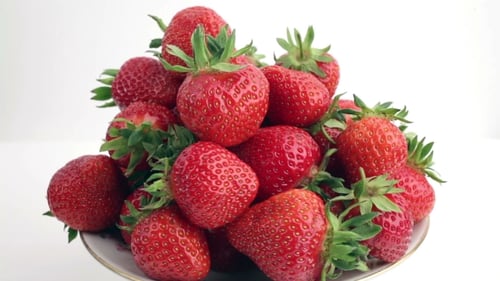 Fresh, Ripe, Juicy Strawberries Rotate.