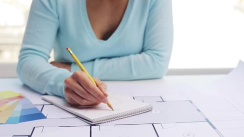 Woman With Blueprint Drawing To Notebook 50