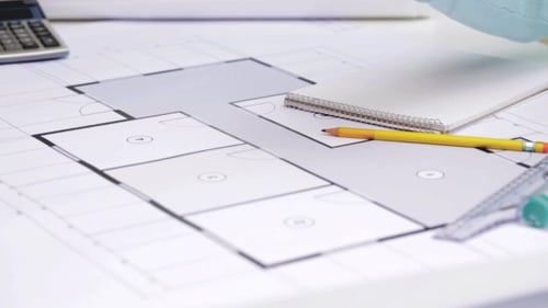 Architect Making a Blueprint at a Drafting Table
