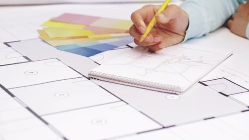Woman With Blueprint Drawing To Notebook 119