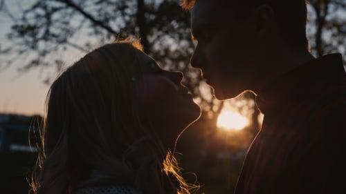 Affectionate Couple Connecting During Beautiful Sunset