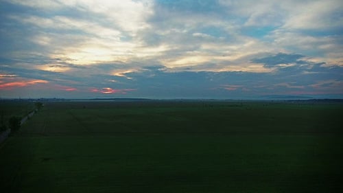 Sunset Over A Field Of Wheat