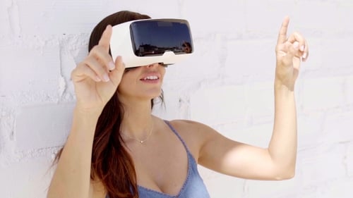 Woman Using Virtual Reality Headset Outdoors