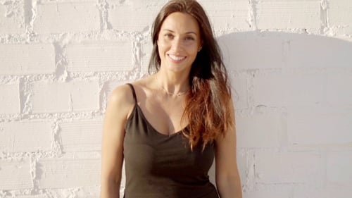 Happy Relaxed Woman Standing In The Summer Sun