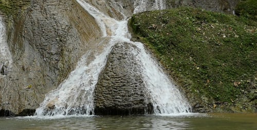 Waterfall In Deep Forest Jungle