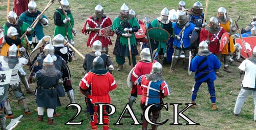 Medieval Combat Re-enactment on Grassy Field