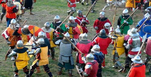 Medieval Knights Clashing in a Grassy Field