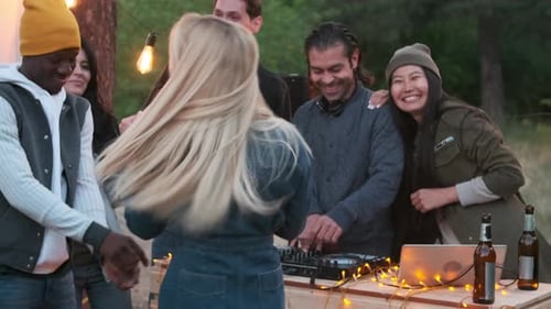 Friends Dancing at an Outdoor Party