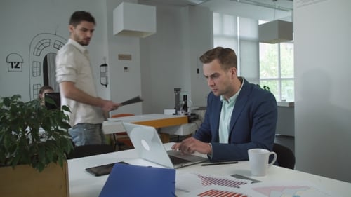 Young Man Entrepreneur Coming To The Office Tax Advisor For Consultation.