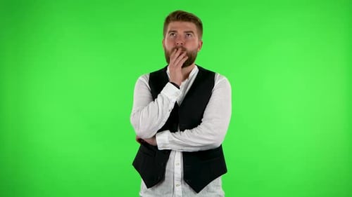 Man Thinks About Something, and Then an Idea Comes To Him. Green Screen