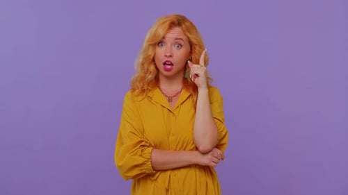 Young Woman Thinking and Getting an Idea