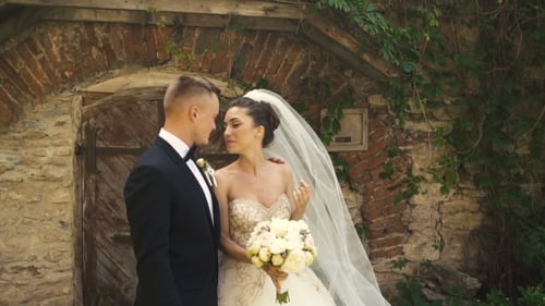 Romantic Couple Embracing on Wedding Day