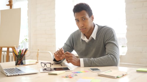 Man in Thought, Serious Designer in Studio
