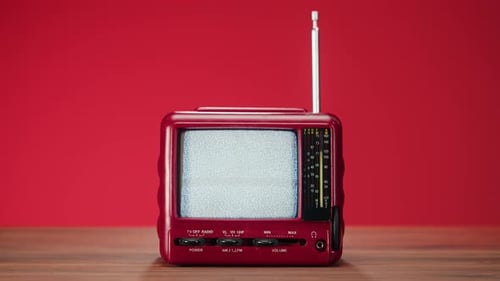 Retro Television Set Powers On, Static Clears