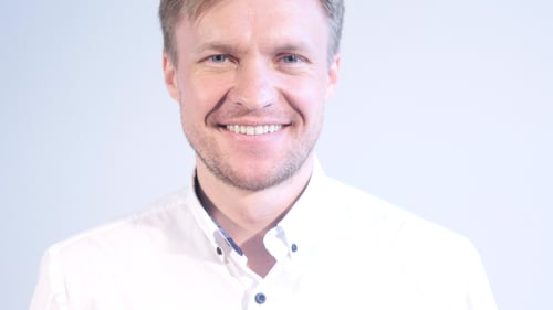 Smiling Man Close-Up in White Shirt