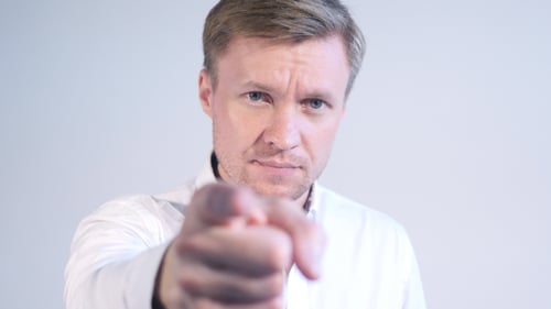 Portrait of Man Pointing toward Camera