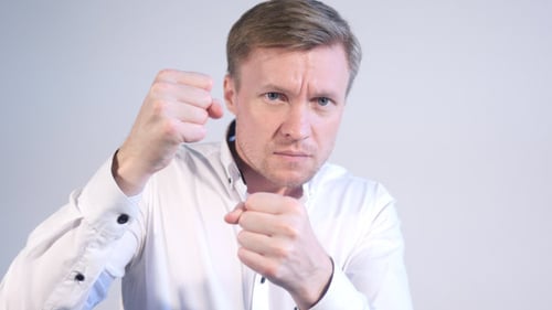 Man with Fists Up in a Fighting Stance