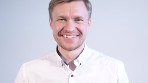 Man Smiling Close Up Wearing White Shirt