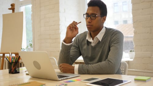 Young Creative Black Man Thinking