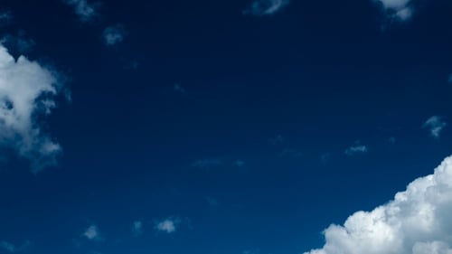Clip Of White Fluffy Clouds Over Blue Sky. Beautiful Cloudscape