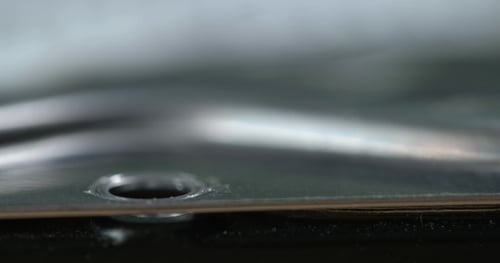 Close Up Tightening Screw with Screwdriver into Metal