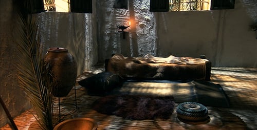 Ancient Home Interior with Clay Pots and Bed