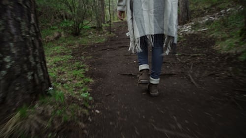 Woman Tracking Sticks Up on the Mountain, Hiking Trips in the Mountains