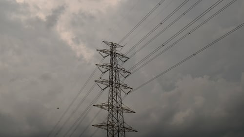 Electrical Tower Against a Moody Sky