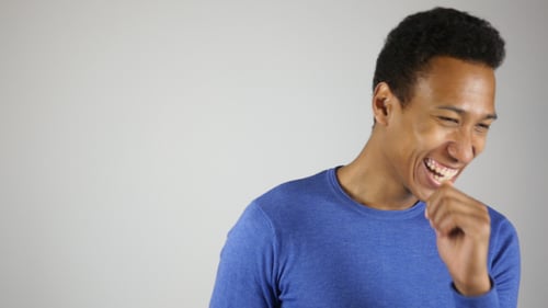 Man Laughing Openly with Joy and Enthusiasm