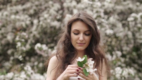 . Beautiful Natural Woman In The Garden Of Apple