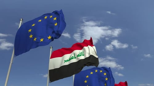 Realistic Flags of Iraq and European Union Waving Against Sky