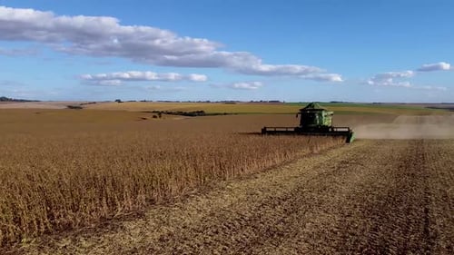 Combine Harvester Farming in Vast Rural Landscape