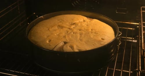 Golden Cake Bakes in Oven