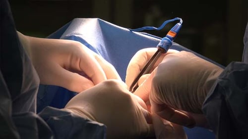 Surgeons Performing Delicate Surgical Operation