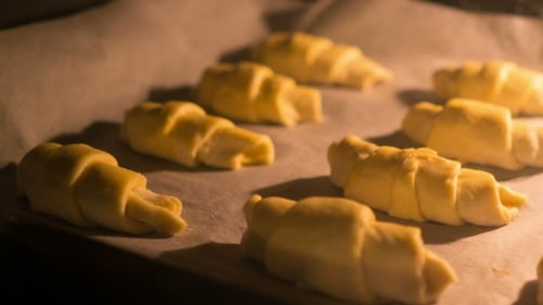 Golden Crescent Rolls Baking in the Oven