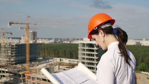 Woman Architect Inspects The Construction Site