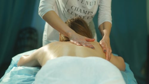 Woman Getting a Back Massage for Relaxation