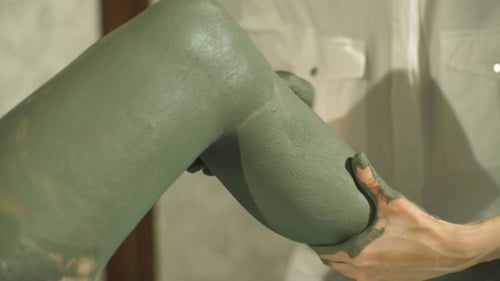 Pregnant Woman Make a Clay Mask For Feet