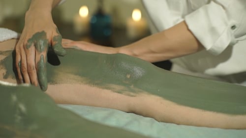 Pregnant Woman Make a Clay Mask For Feet