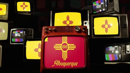 Vintage Televisions Displaying Albuquerque Flag and Static