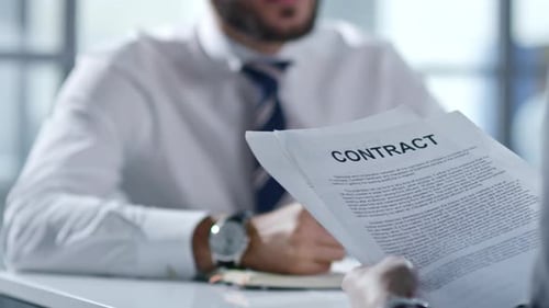 Business Partners Discussing Contract
