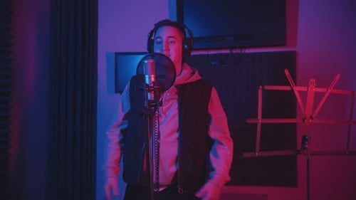 Male Artist Singing in a Recording Studio