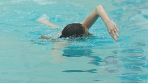 The Girl Floating In The Pool