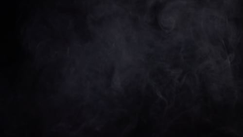Swirling White Smoke Against a Dark Background